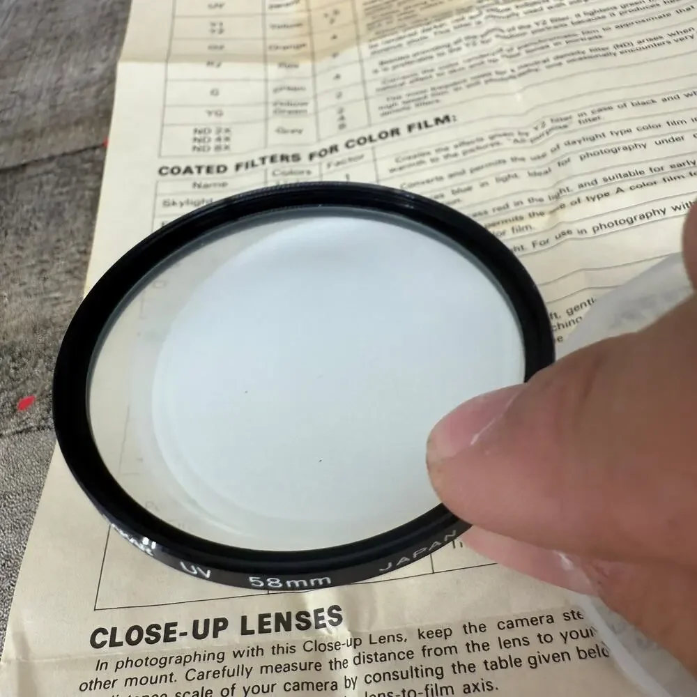 Sakar 52mm Camera Lens Filter Coated UV 58MM W/ Paper Guide